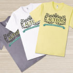 Autism t-shirt is available on white, lemon and slate t-shirts